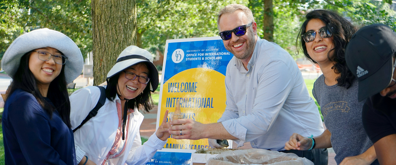 Resources International students, scholars, and family join staff at the summer social