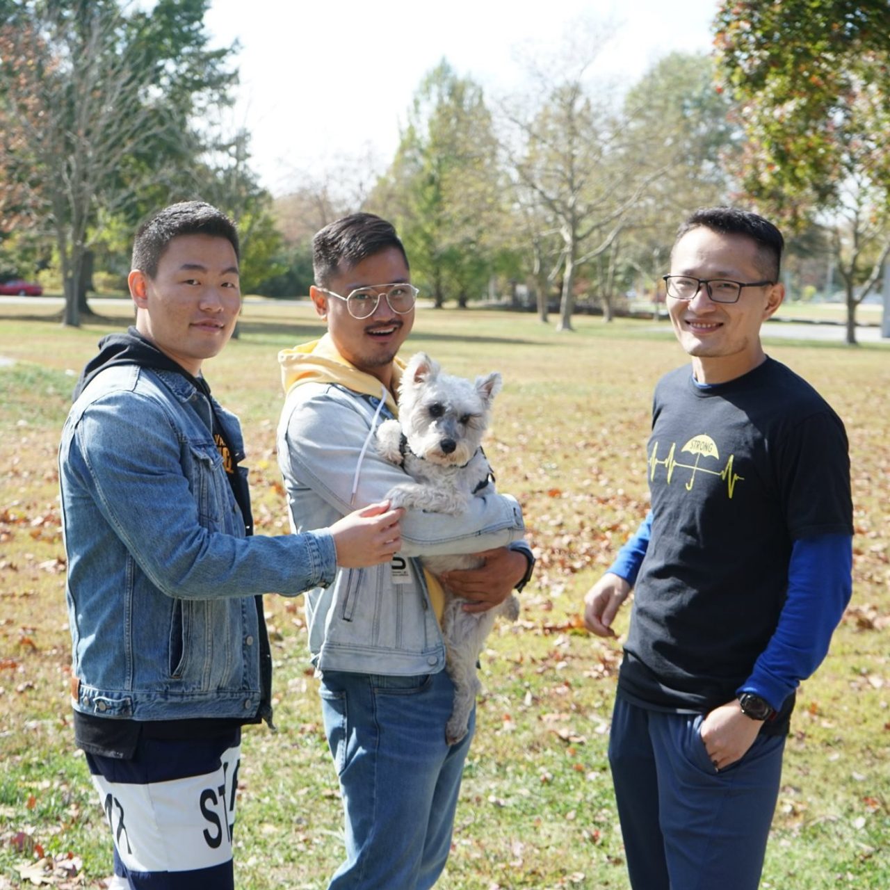 A photo of students and a dog