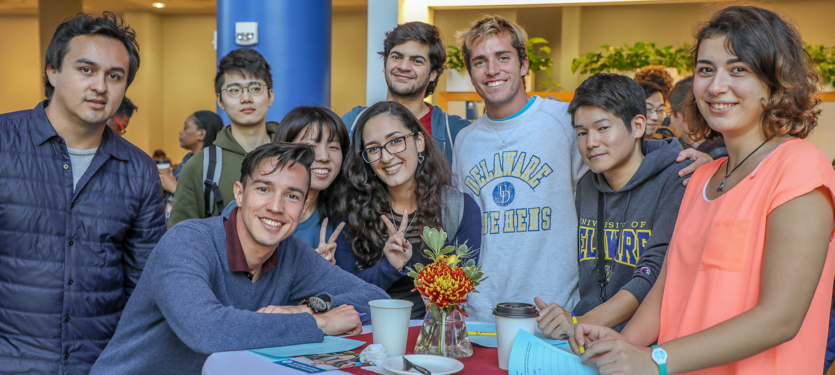Students pose for a photo at International Coffee Hour