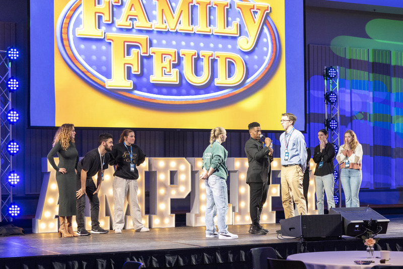 Host and hype man Blake Saunders led two student groups in a rousing version of Family Feud for prizes.