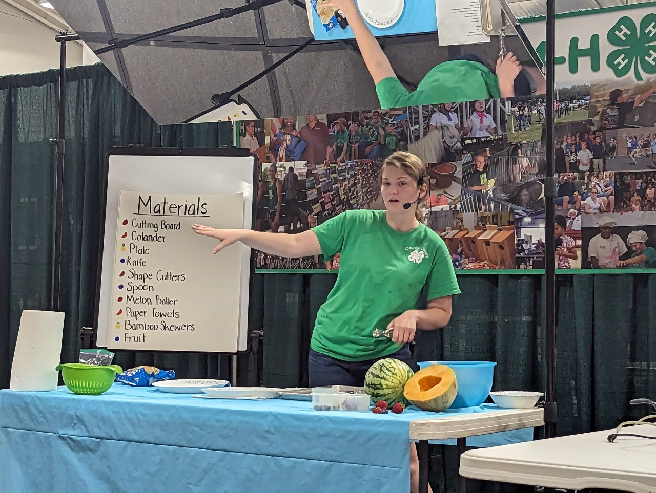 Female 4-H member competing in public speaking event Female 4-H member competing in public speaking event