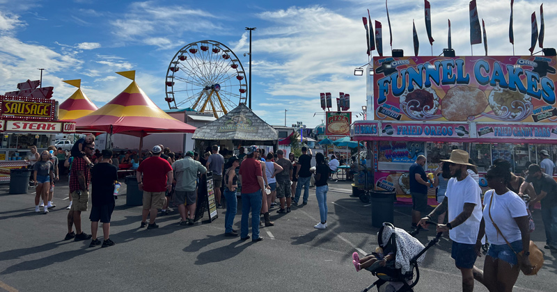 A view of the Delaware State Fair complete with Ferris wheel. A view of the Delaware State Fair complete with Ferris wheel.