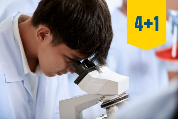 A student using a microscope.