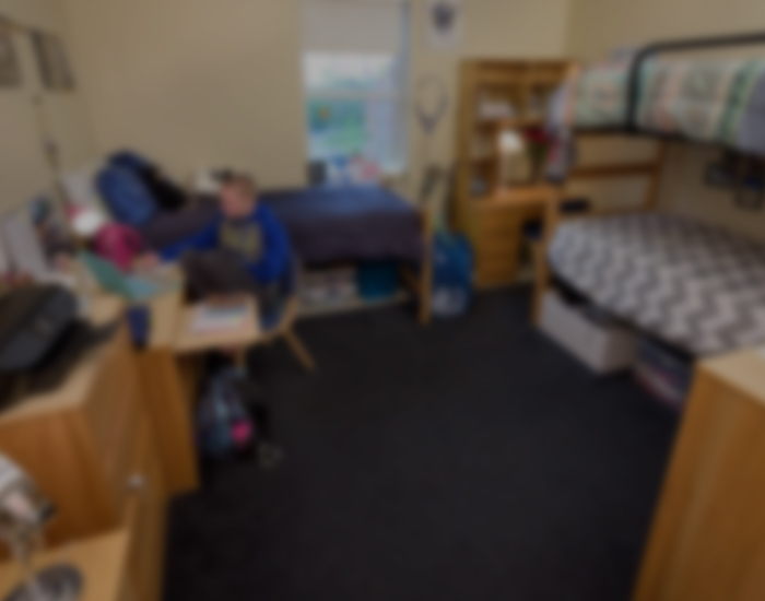 interior view of a triple dorm room