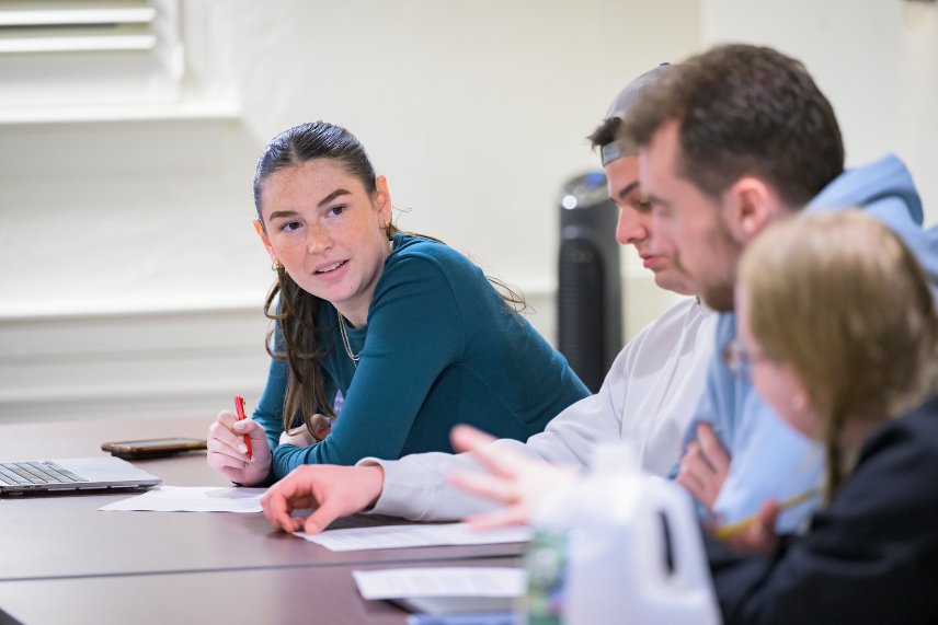 Photo of two students engaged in discussion during a Biden Institute political fundraising seminar