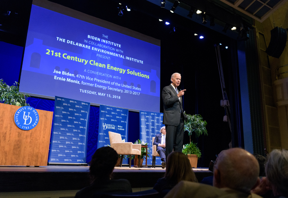 Photo of then-former Vice President Joe Biden and former U.S. Secretary of Energy Ernest Moniz onstage during the 21st Century Clean Energy Solutions town hall event