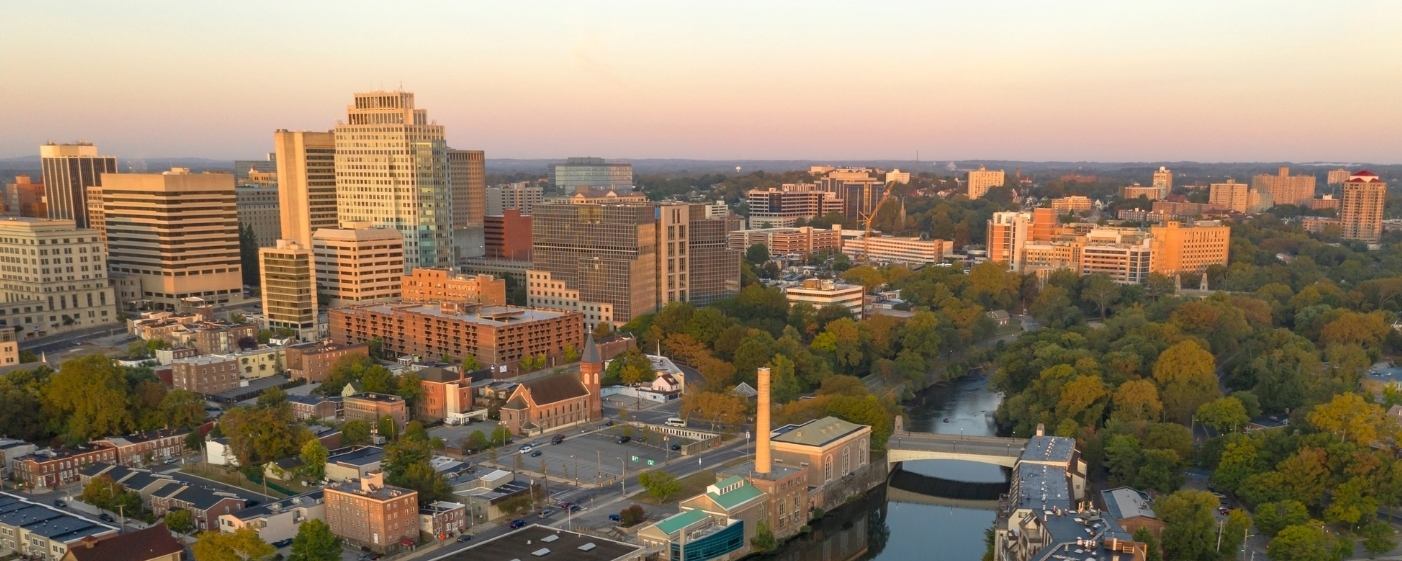 An aerial view of the City of Wilmington, Delaware, and the Brandywine River at sunset