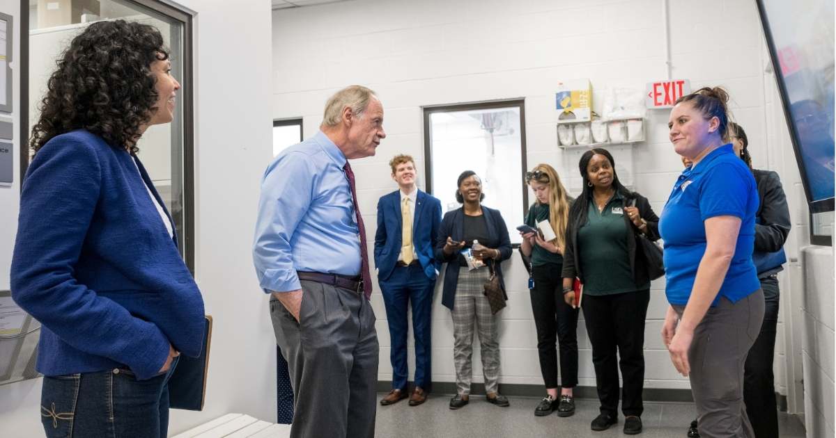 Jennifer Rodammer (right), director of the UDairy Creamery, details the Genuardi Food Innovation Laboratory for Agriculture Deputy Secretary Xochitl Torres Small (left) and Delaware U.S. Senator Tom Carper (center).