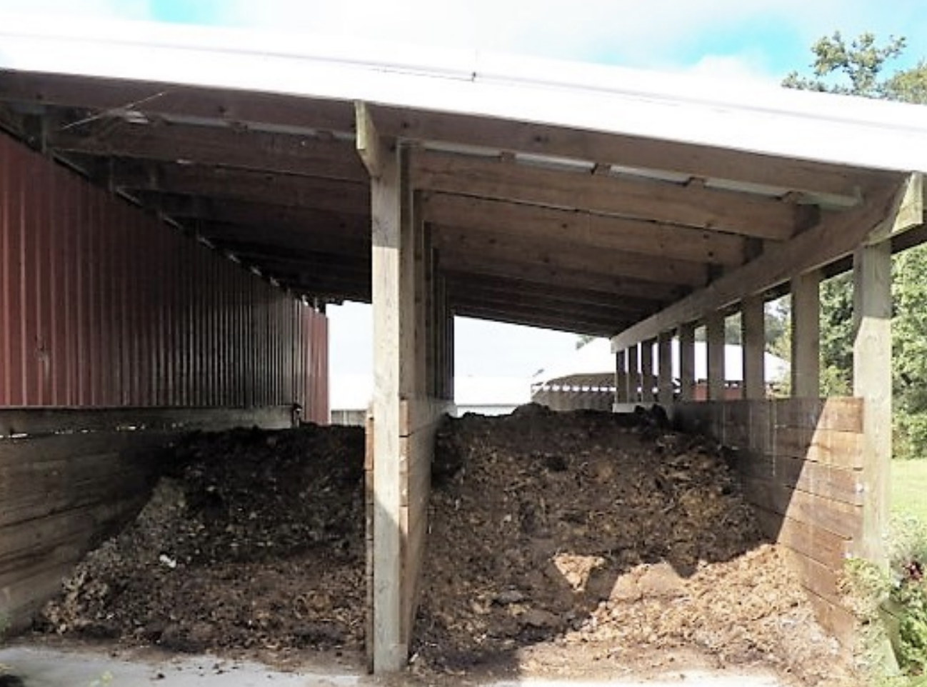 Example of a permanent channel style mortality composter. Photo credit: Nutrient Management Program, University of Delaware Example of a permanent channel style mortality composter. Photo credit: Nutrient Management Program, University of Delaware