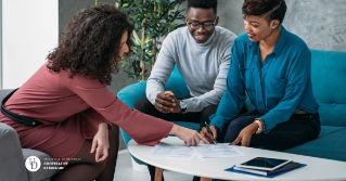 A couple discussing finances with a credit counselor