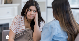 A mother talking to her daughter