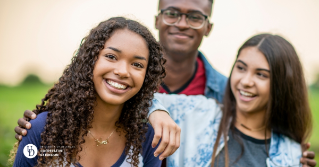 Three teens together smiling