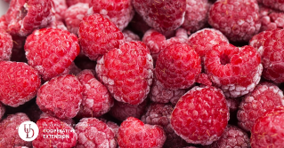 A photo of frozen raspberries