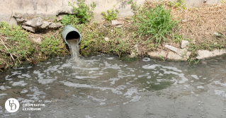 A photo of stormwater coming out of a pipe