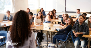 A teacher in a high school class