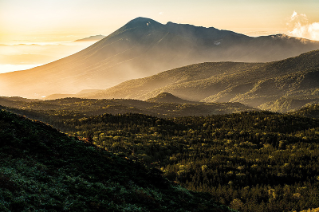 Misty mountain landscape at sunrise