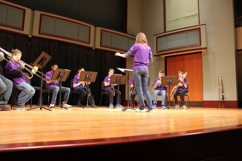 First State Middle School Trombone Players on Stage with Teacher