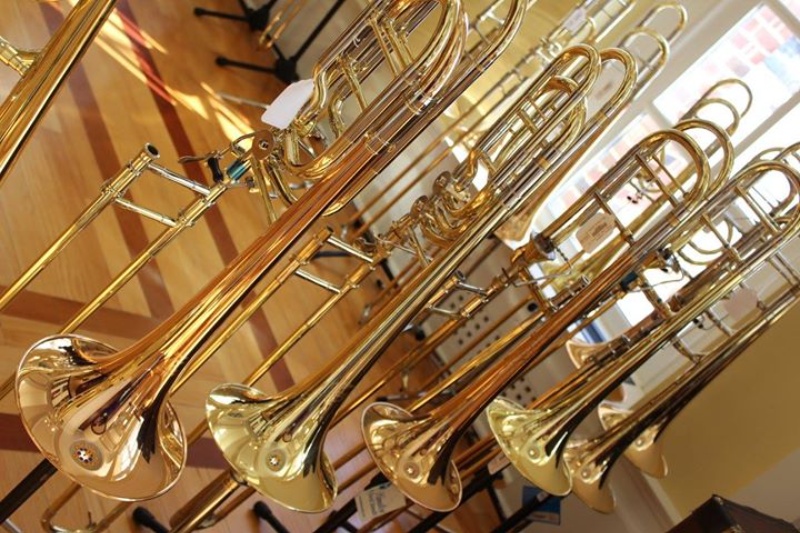 Rows of trombones places in stands