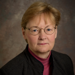 Headshot photo of Lu Ann De Cunzo