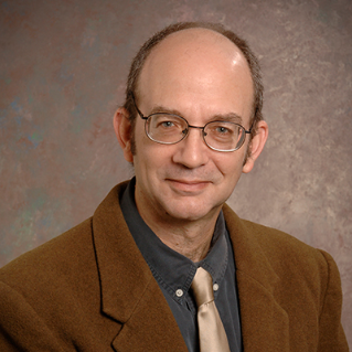 Headshot photo of Alan David Fox