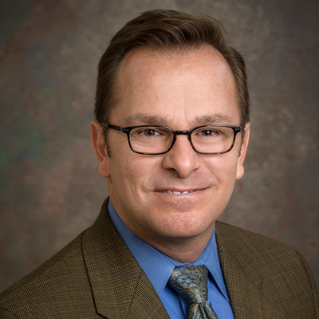 Headshot photo of Thomas M. Powers