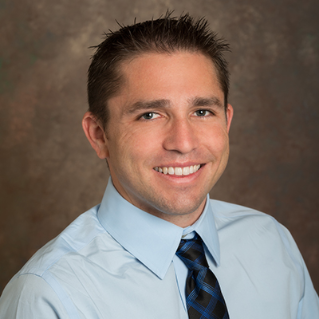 Headshot photo of Joshua Neunuebel