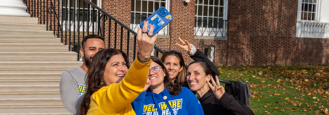 Employees taking a selfie at Walktober 2023