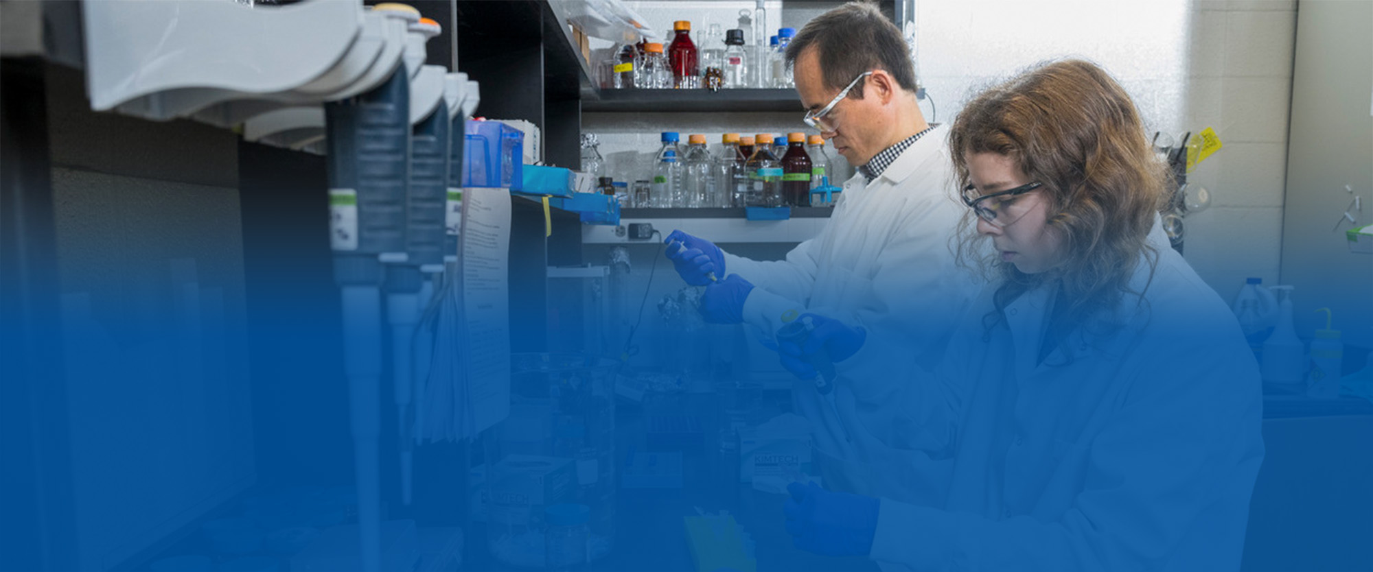 Yanbao Yu, director of proteomics in the University of Delaware’s Department of Chemistry and Biochemistry, and mass spectrometrist Kathryn Martin apply the UD method for proteomics sample preparation to various biological samples.