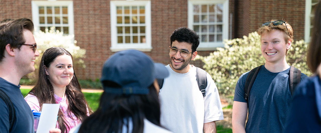 Smiling students at the Wellbeing Spring Support Fair