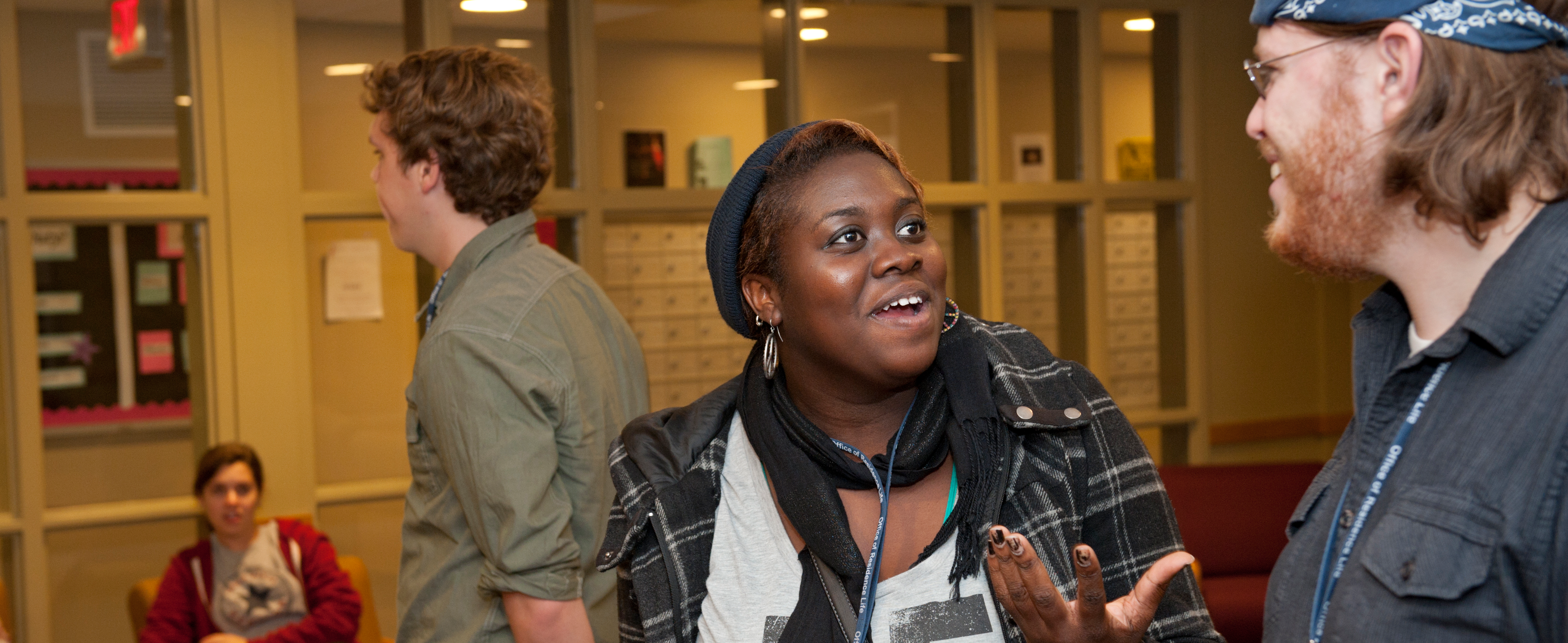 Students talking in the James Smith/Thomas McKean lounge