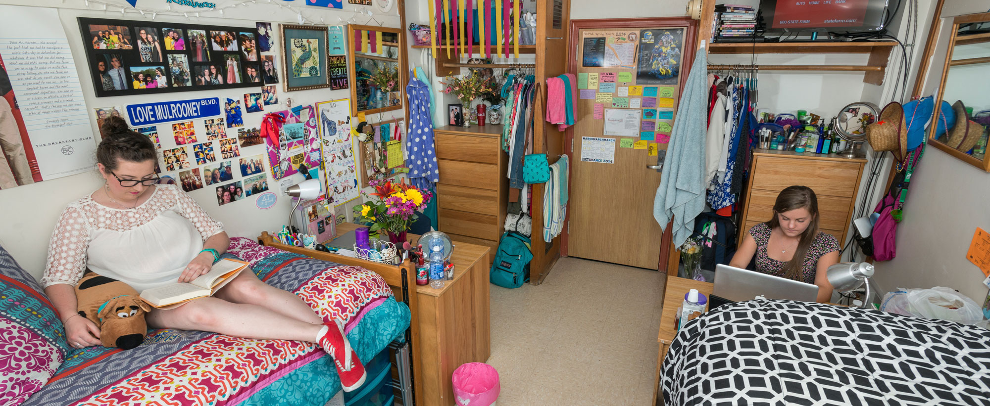 Students studying in a decorated residence hall room