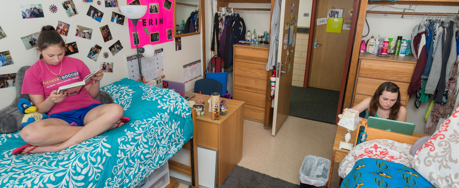 Students studying in a decorated residence hall room