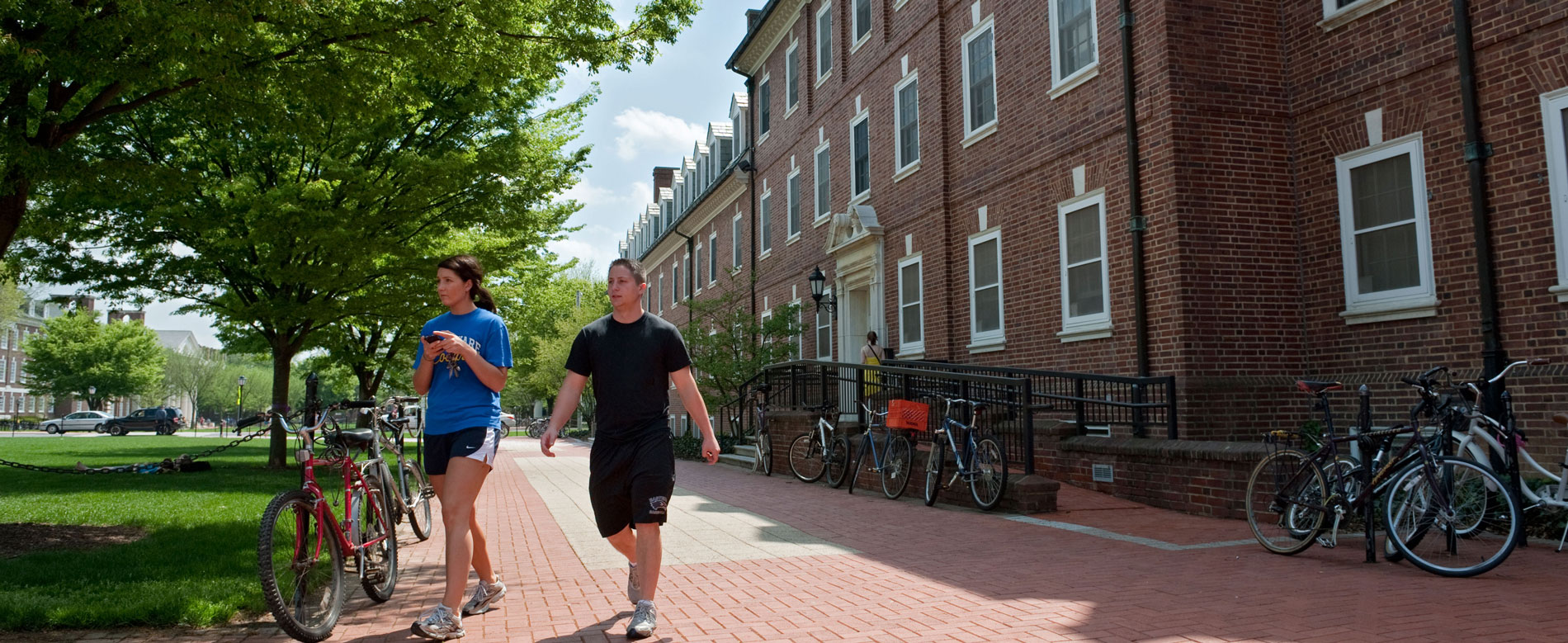 Students walking past North Central residence halls