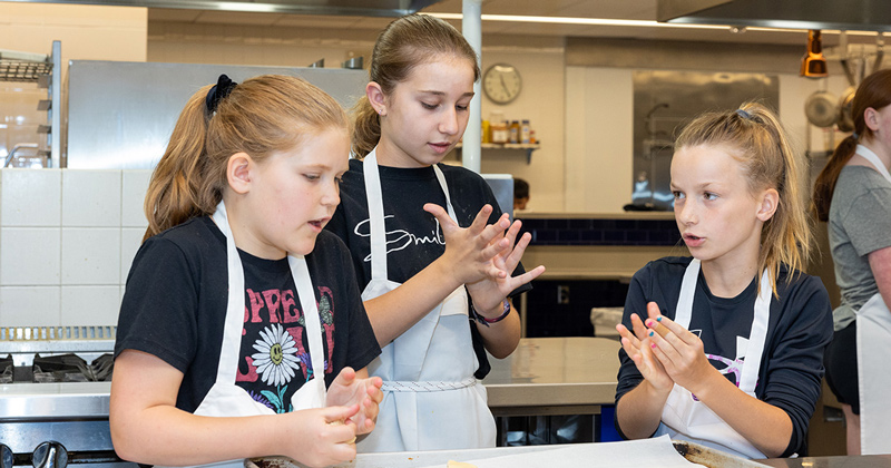 Children learn about cooking at UD’s Vita Nova