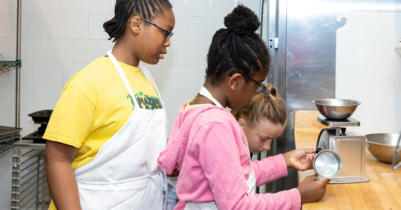 Children learn about cooking at UD’s Vita Nova