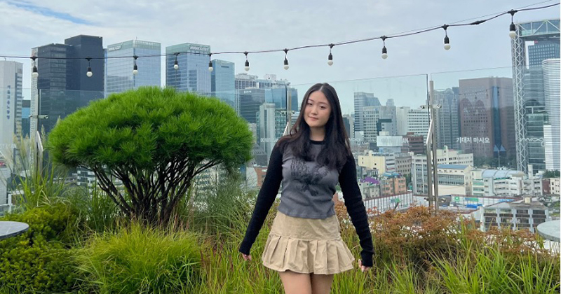 Sydney Castiglia, a senior cognitive science major, took in the Seoul skyline from the hotel rooftop during her 2023 visit to South Korea. 