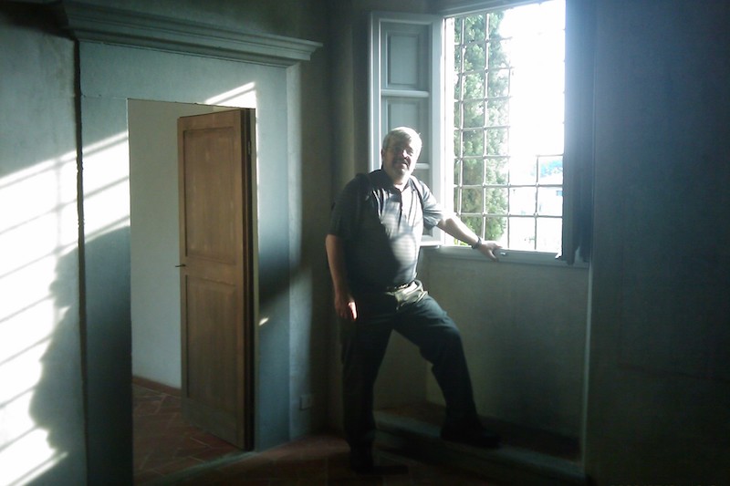 Bill Matthaeus standing by window