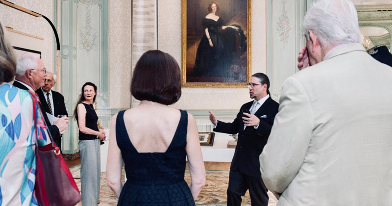 Joe Angemi, senior curator for the U.S. Department of State, at a 2022 exhibit in Paris celebrating the Franco-American legacy. 