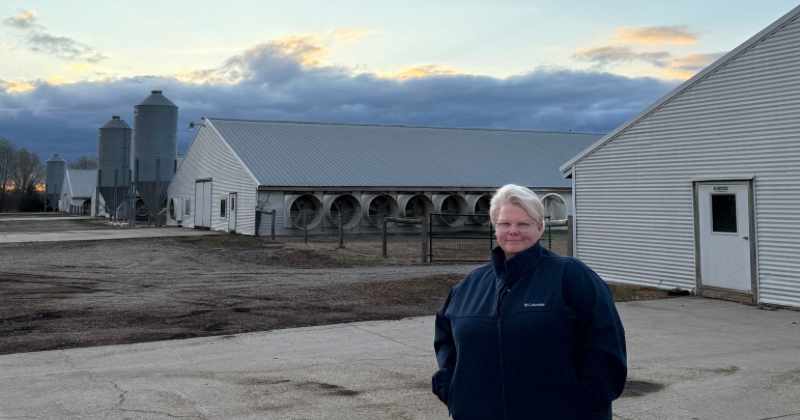 Georgie Cartanza, the University of Delaware Cooperative Extension poultry extension agent, stands in front of her four empty poultry houses in Mid March. She looks forward to a new, healthier, disease-free season ahead and a renewed sense of optimism from the lessons she learned over the winter of 2025. 