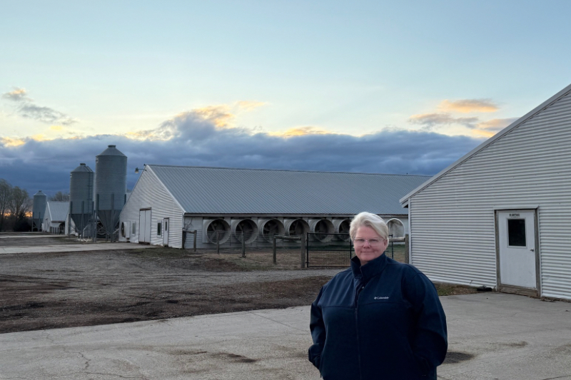 Georgie Cartanza, the University of Delaware Cooperative Extension poultry extension agent, stands in front of her four empty poultry houses in Mid March. She looks forward to a new, healthier, disease-free season ahead and a renewed sense of optimism from the lessons she learned over the winter of 2025.