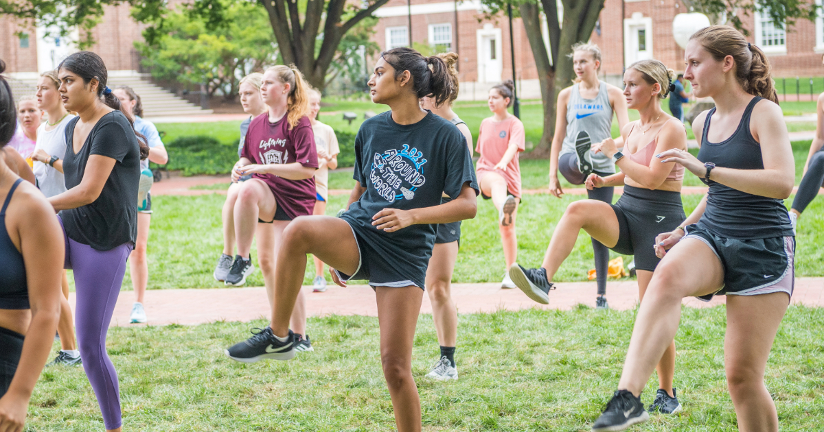 Students take Zumba class on The Green during Welcome Days