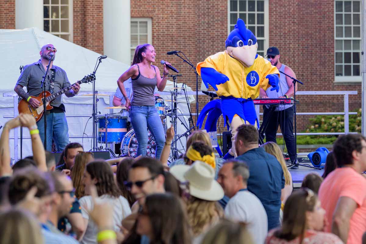 YoUDee dances on stage during a performance at Senior Fling