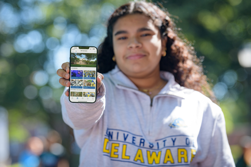 UD student Maya Feinstein shows off the new UD Connect app.