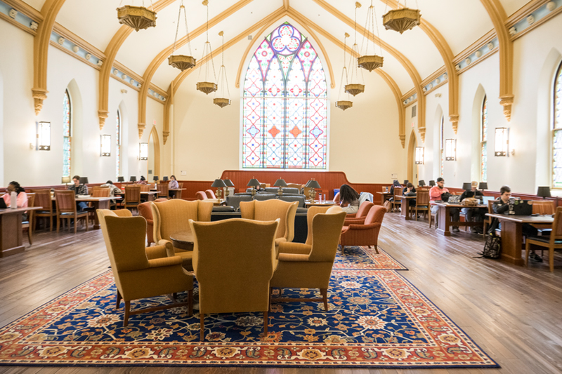 Daugherty Hall is a tranquil study and gathering space with dramatic arched stained glass windows.