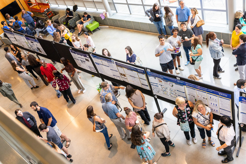 Hundreds of undergraduate students pursue research projects at the University of Delaware and the Undergraduate Research Program hosts an annual symposium celebrating this work. This photo is from the 2023 event. The 2024 Symposium of Undergraduate Research and Creative Activity will be held Thursday, Aug. 8. Hundreds of undergraduate students pursue research projects at the University of Delaware and the Undergraduate Research Program hosts an annual symposium celebrating this work. This photo is from the 2023 event. The 2024 Symposium of Undergraduate Research and Creative Activity will be held Thursday, Aug. 8.