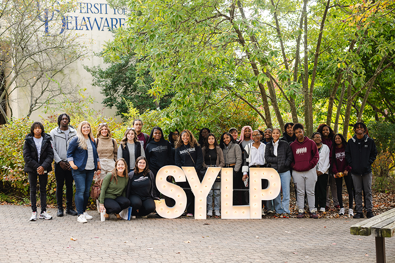 Local high school students pose outside of Clayton Hall during the Siegfried Youth Leadership Program event held in October.