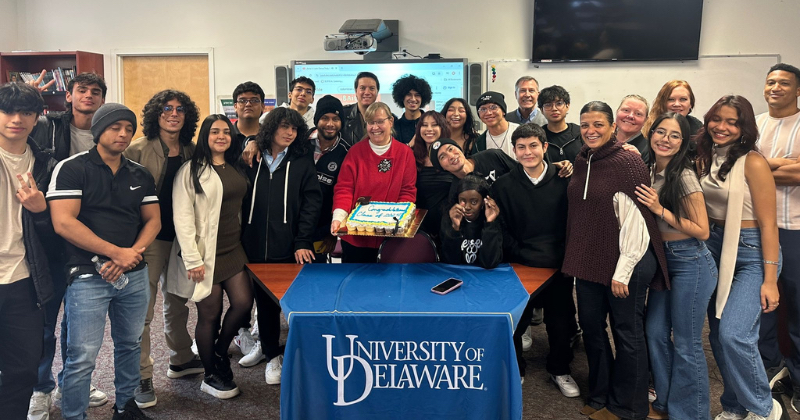 Twenty students from Colombia spent part of the fall semester at UD in the Intensive English Language program at the English Language Institute through the Friends of the Fulbright program. Here they gather with ELI Director Cheryl Ernst at their graduation ceremony.