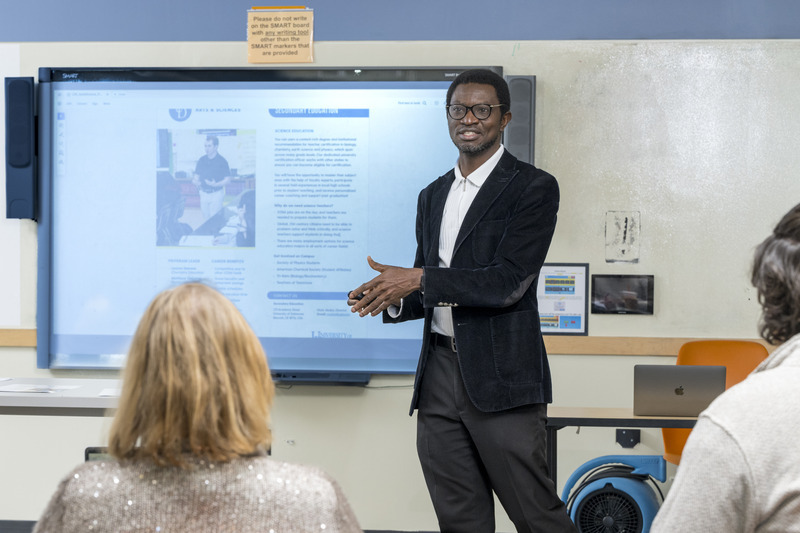 Akubo draws on his childhood in Nigeria to help secondary science education students learn how to make connections in their classrooms. Akubo draws on his childhood in Nigeria to help secondary science education students learn how to make connections in their classrooms.