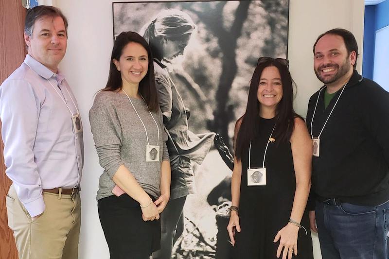 Alumna Erika Fleury (second from left) worked with staffers from The Jane Goodall Institute to launch World Chimpanzee Day in 2018. It’s celebrated annually on July 14, the day Jane Goodall first arrived in what is now Tanzania’s Gombe Stream National Park to begin her groundbreaking field study of wild chimpanzees. Alumna Erika Fleury (second from left) worked with staffers from The Jane Goodall Institute to launch World Chimpanzee Day in 2018. It’s celebrated annually on July 14, the day Jane Goodall first arrived in what is now Tanzania’s Gombe Stream National Park to begin her groundbreaking field study of wild chimpanzees.